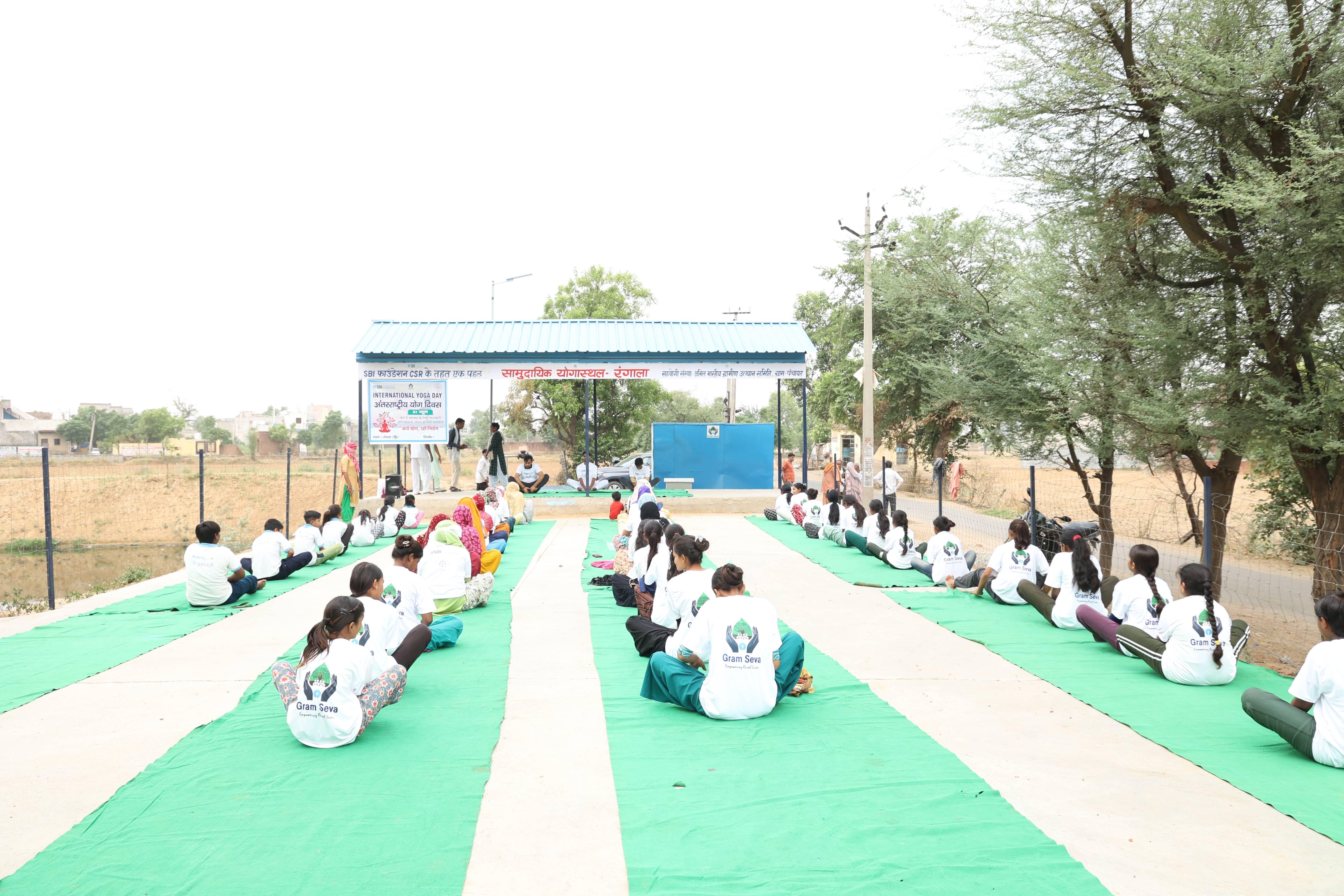 International-Yoga-Day-Celebration-by-Akhil-Bhartiya-Gramin-Uthan-Samiti-(ABGUS)-with-SBI-Foundation-under-Gram-SEVA-Program-at-Nuh